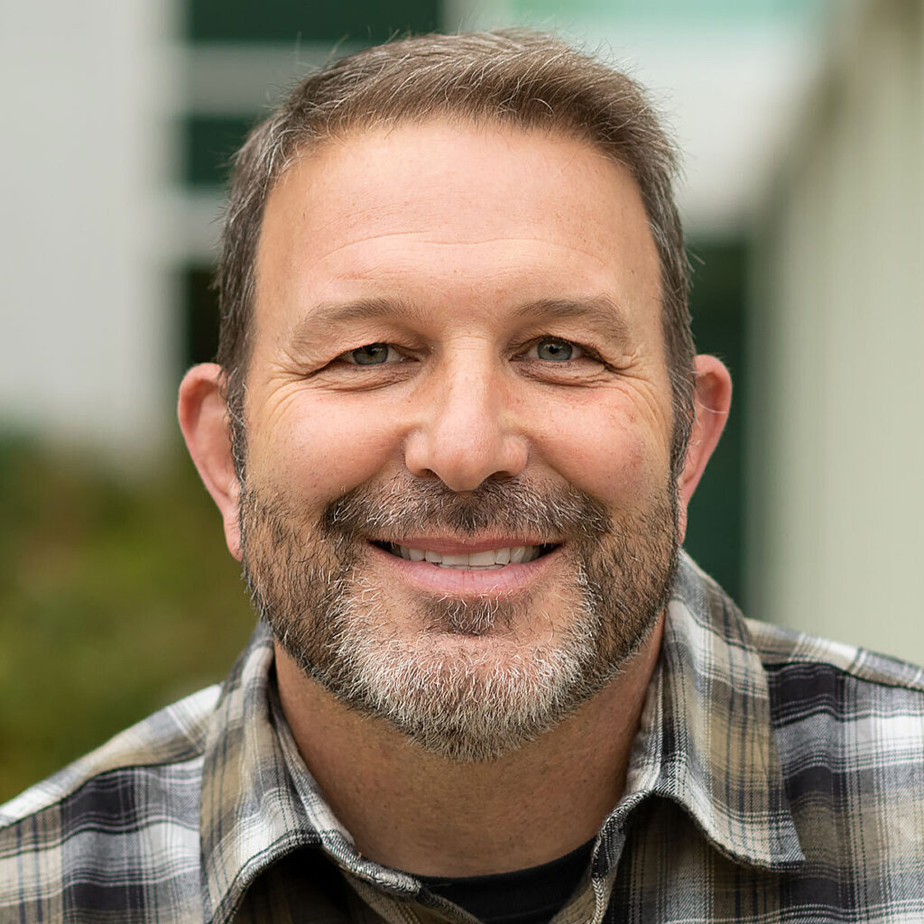 Professional portrait of GLY employee Jamie Hawk.