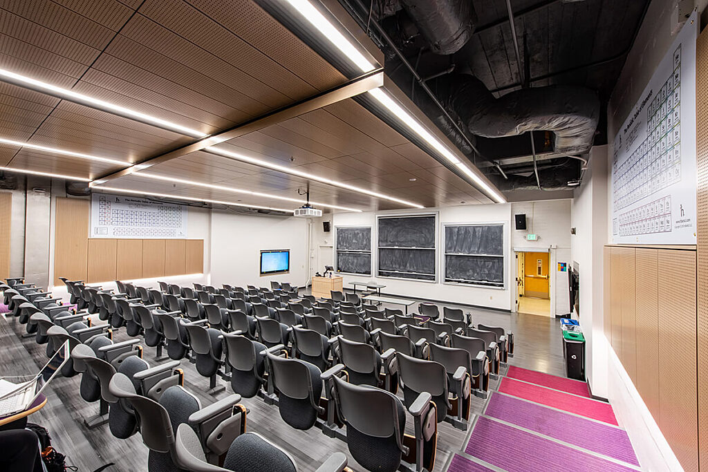 Bagley Hall classroom has rows of seats and a wall of blackboards at the front