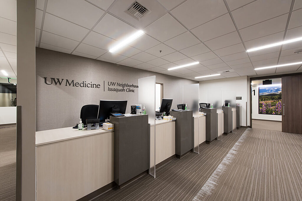 four computers at a long reception desk area at medical clinic in Issaquah