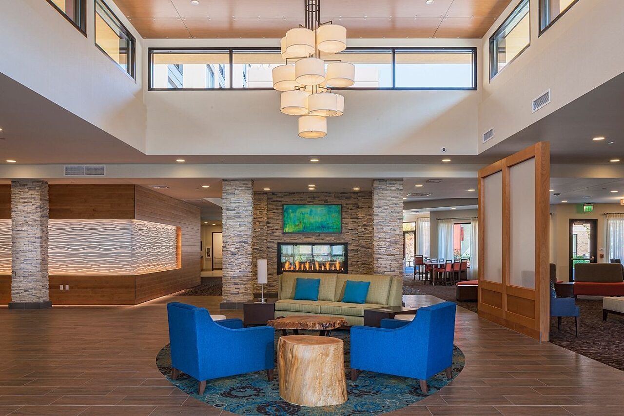 Common space and waiting area with celestory in the Homewood Suites by Hilton