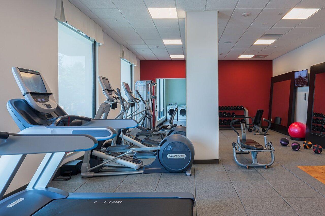 Gym with treadmill and eliptical machines at Homewood Suites by Hilton