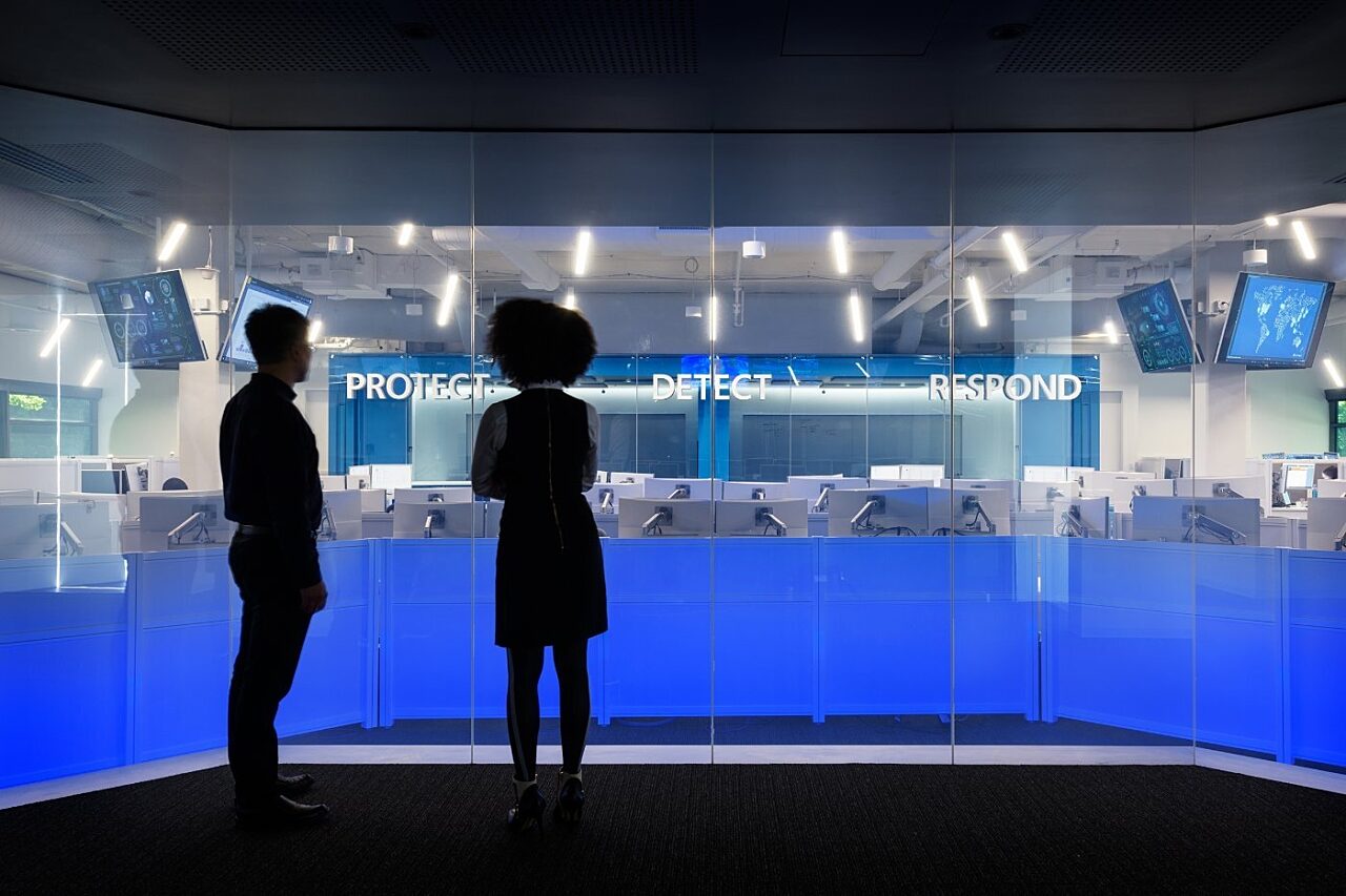 People viewing the control room in the Cyber Defense Operations Center at Microsoft