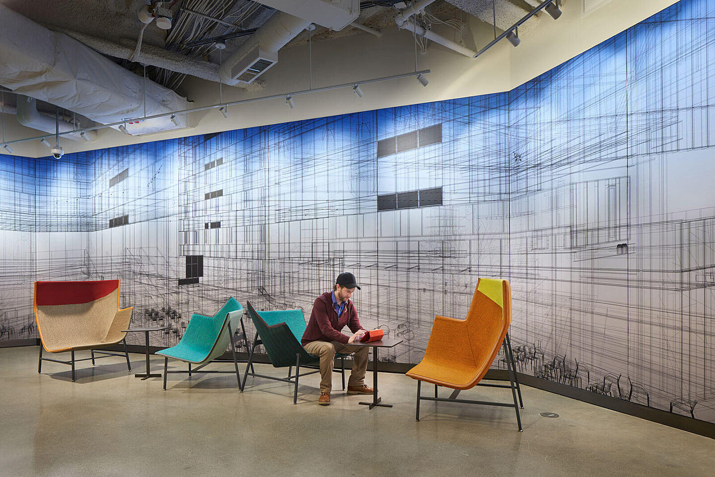 Man working inside of Amazon Block 21