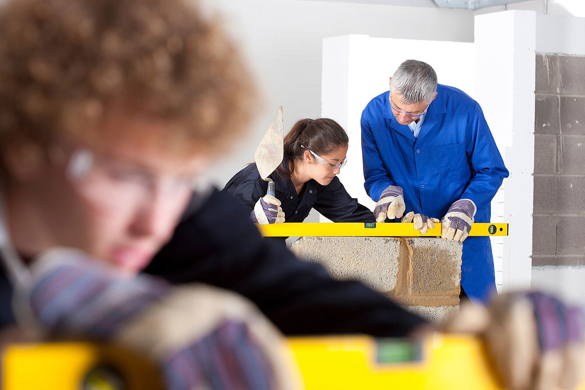 Young students learning construction