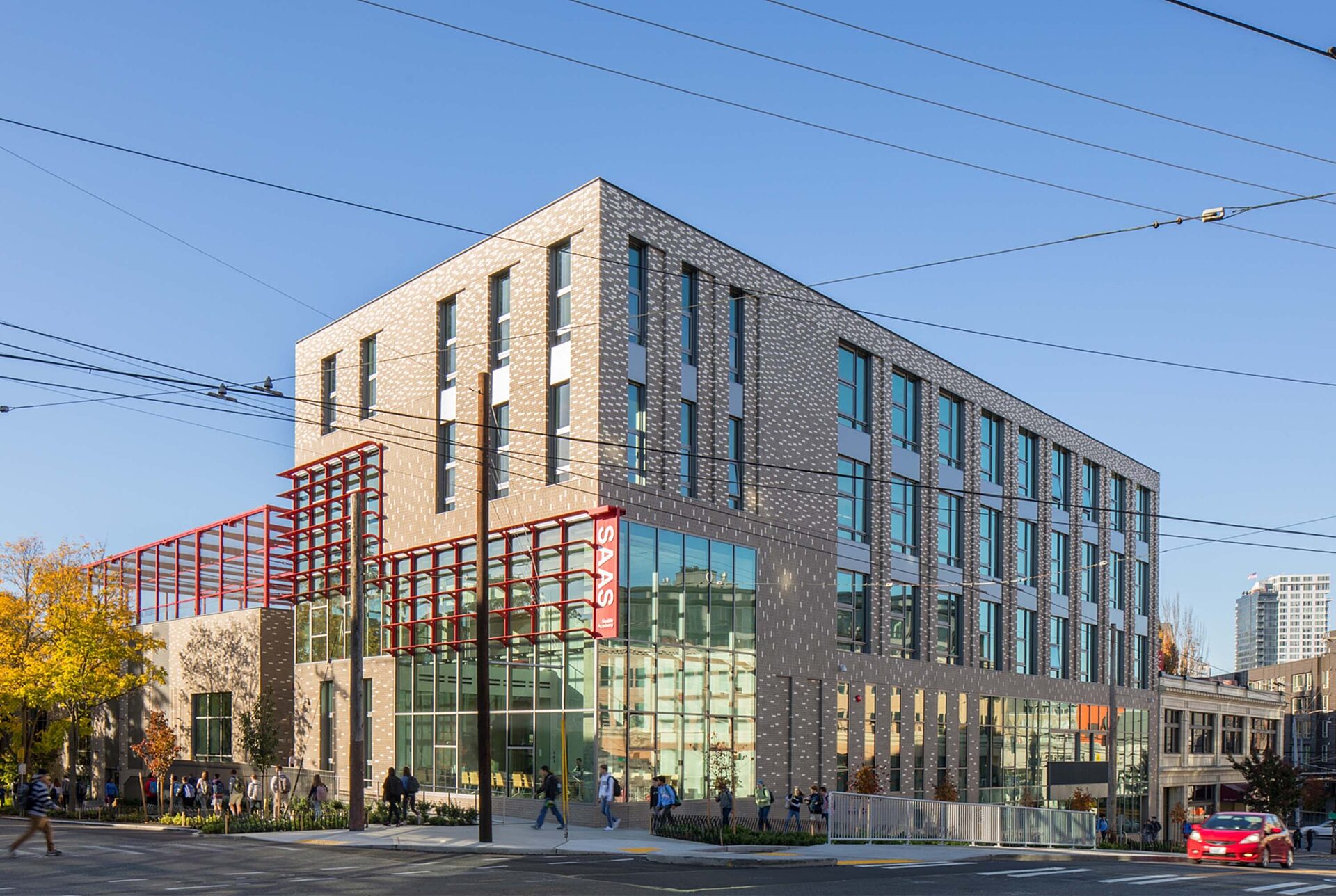 4-story building in urban area with lots of windows and natural light spilling in