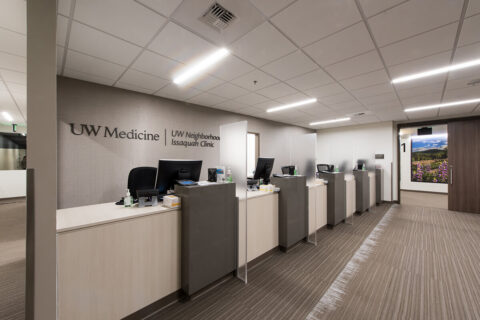 four computers at a long reception desk area at medical clinic in Issaquah