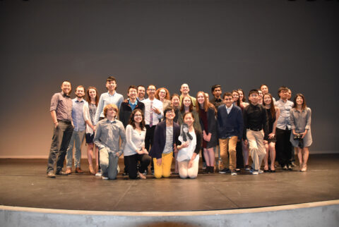 A group of students on a stage.