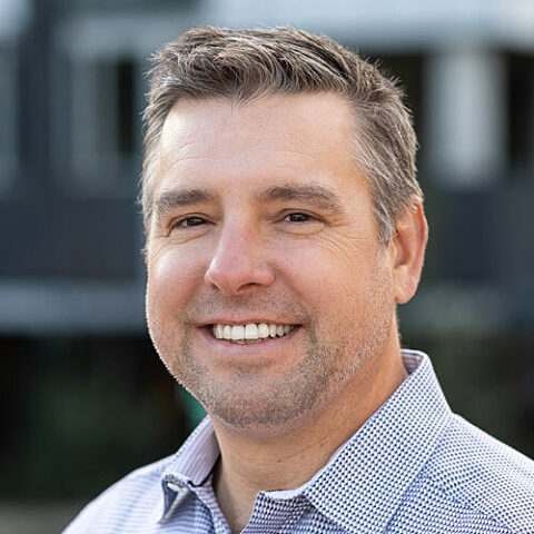 Professional portrait of GLY employee Greg Burke.